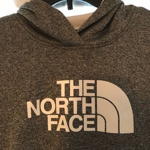 gray dry-fit north face sweatshirt